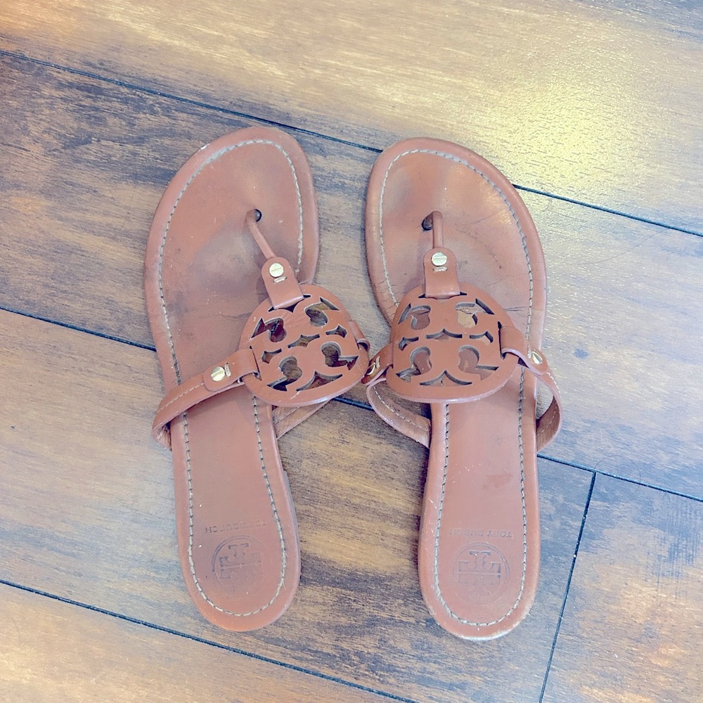 Tory Burch flat sandals. Can be styled with many outfits.